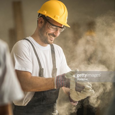 Happy Construction Worker Preparing for the Job